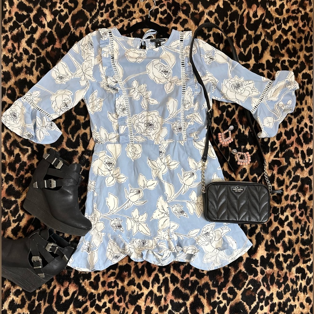 Aqua brand bell sleeves romper in sky blue with white roses